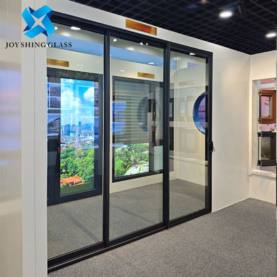 Puerta horizontal corredera de PVC con doble acristalamiento
